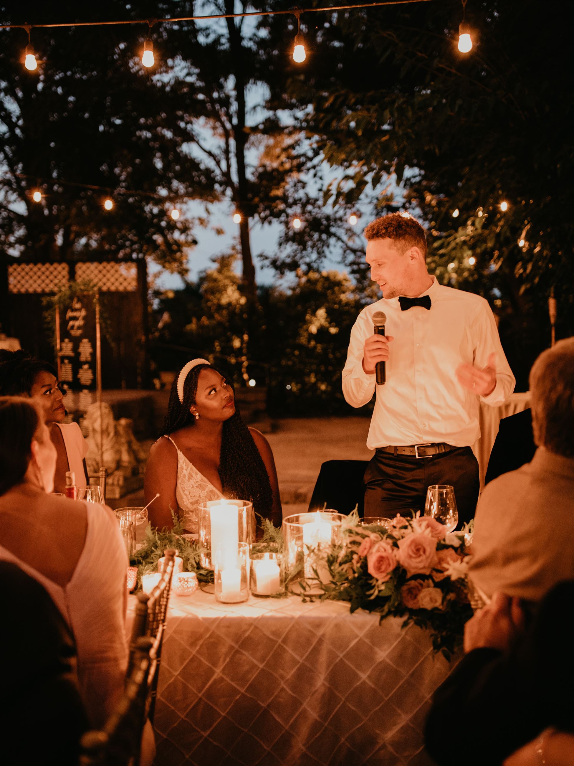 Groom giving speech after wedding ceremony